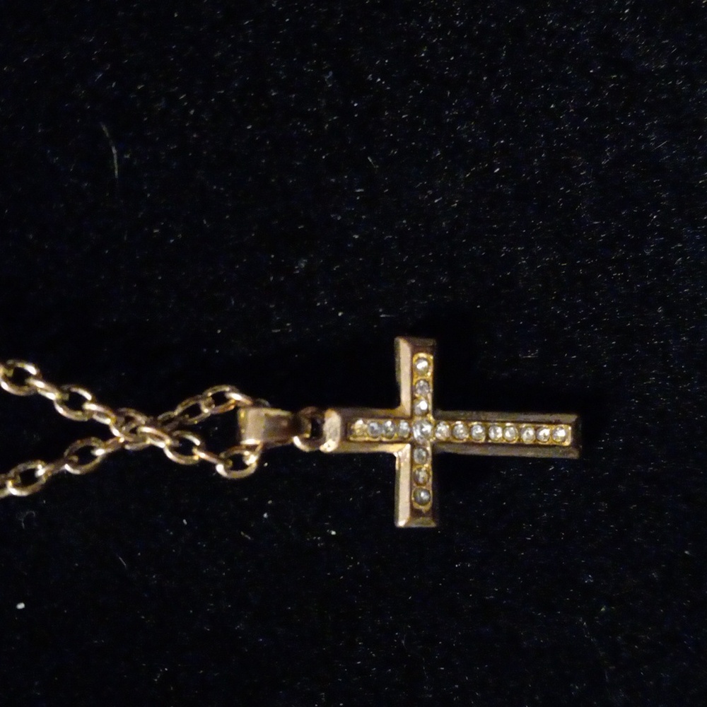 18+2" gold tone circle link chain with a crystal encrusted cross pendant